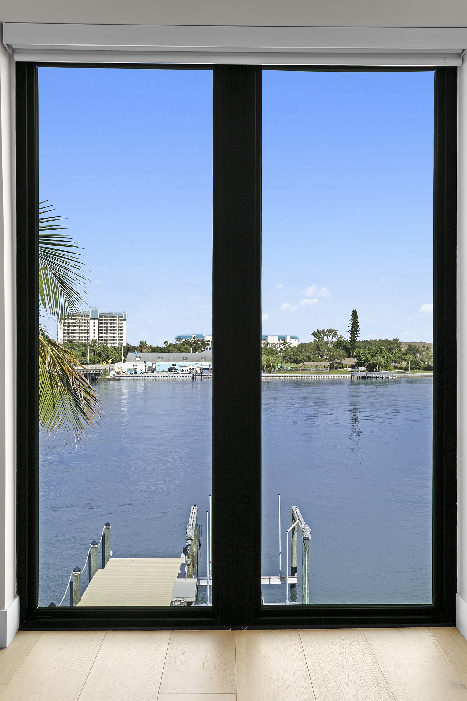 Glass doors opening straight out to the private dock